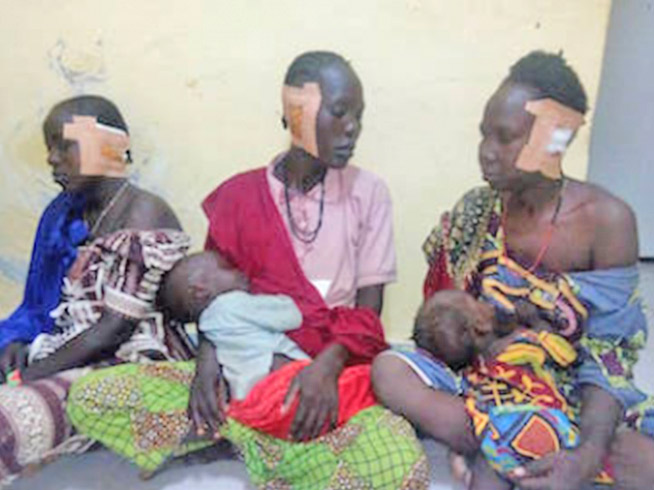 The three women pictured each had one of their ears cut off by Boko Haram Islamist militants who raided the mainly Christian town of Gagalari, Cameroon, on 31 July