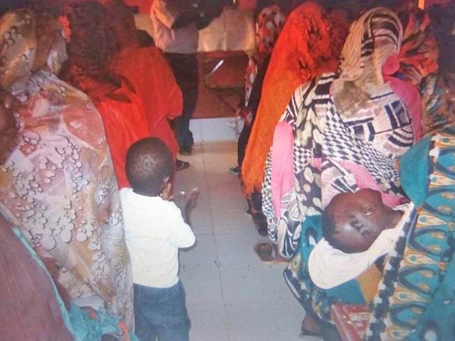 Christian women and children in the prison chapel. Will you support a Sudanese prison ministry that helps with their spiritual, emotional and practical needs?