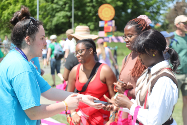 Barnabas Aid volunteer with people at Big Church Festival