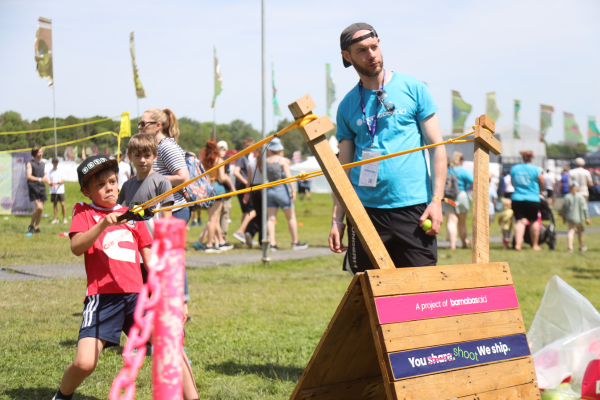 image of boy using catapult at Big Church Festival