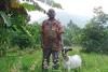 Ugandan Christian, Eryeza receives Barnabas-funded goat.