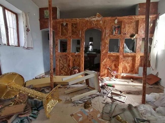 Wrecked interior of the small church near Moria, Lesbos, after it was vandalised