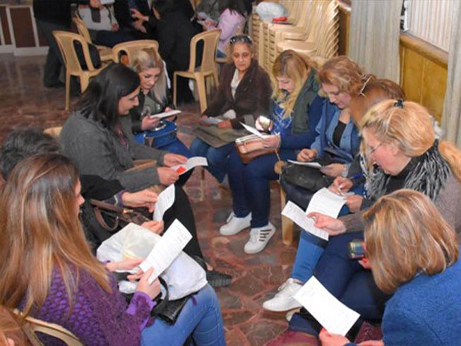 Widows studying the Bible together