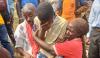 A Christian family in Uganda grieves for the loss of their loved one after the massacre of a Christian school on the night of 16 June 2023